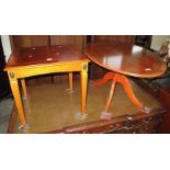 Two reproduction yew wood furnishing items to include: a square lamp table and an oval coffee table.