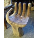 Unusual carved hardwood chair in the form of a hand. (B.P. 24% incl.