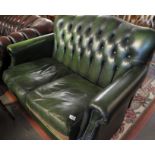 Thomas Lloyd green leather chesterfield style two seater sofa. (B.P. 24% incl.