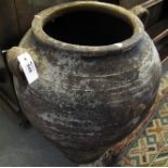 Large terracotta olive pot of baluster form with lug handles. (B.P. 24% incl.