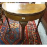 20th Century walnut D ended fold over card table on cabriole legs and pad feet. (B.P. 24% incl.