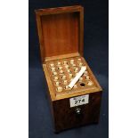 Early 20th Century burr walnut musical and mechanical cigarette box dispenser with ebonised ball