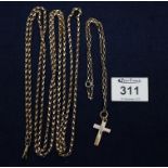 Victorian 9ct gold guard chain and a yellow metal cross on yellow metal chain, total weight 44.