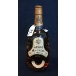 Grand Macnish 100% Scotch whisky, blended and bottled by Robert Mcnish & Co, Ltd, Glasgow, Scotland.