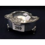 Silver rococo style C scroll and foliate repousse decorated dressing table box with hinged cover on