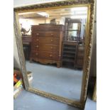 Large modern bevel plate gilt frame mirror with moulded foliate and beaded decoration. (B.P.