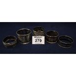 Group of assorted silver napkin rings. (5) (B.P. 24% incl.