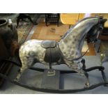 Carousel type dapple grey child's rocking horse with saddle. (B.P. 24% incl.