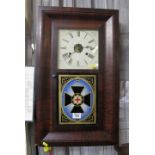 Early 20th Century American New Haven two wall clock with key and weights. (B.P. 24% incl.
