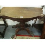 19th Century mahogany serpentine fronted, folding card table, missing its baize,