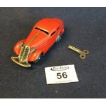 Vintage Schuco tinplate clockwork coupe in red, with key. (B.P. 24% incl.