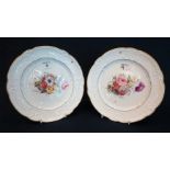 Two similar Nantgarw porcelain plates both with indented rims and relief moulded borders,