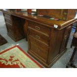 Good quality modern Mexican pine pedestal desk with recessed handles and leather top. (B.P.