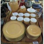 27 piece Royal Doulton coffee set on an orange and gilded ground. (B.P. 24% incl.