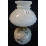 Brass double burner oil lamp with painted ceramic base and white glass shade. (B.P. 24% incl.