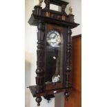 Early 20th Century Vienna type two train wall clock with key and pendulum,