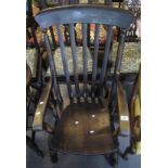 Late 19th Century stained elm and beech slat backed farmhouse kitchen armchair. (B.P. 24% incl.