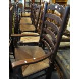 Set of five early 20th Century ladder back chairs with rush seats,