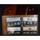 Great Britain collection of presentation packs in four Post Office/Royal Mail albums,
