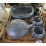 Tray of pewter to include: three piece tea service; beaten pewter bowl etc. (6) (B.P. 24% incl.