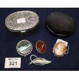 A shell cameo brooch with 9ct gold frame and a silver plated box containing three brooches. (B.P.