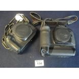 Two Canon camera bodies, EOS-1 and EOS 600, one with motor drive. (2) (B.P. 24% incl.