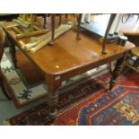 Late 19th Century pine farmhouse kitchen table on turned supports and casters. (B.P. 24% incl.