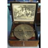 Victorian walnut cased clockwork 'Symphonion', together with a collection of metal discs. (B.P.