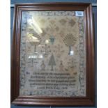 Framed child's sampler by Laura Maria Kelly dated 1860 with the religious text 'O Let us for the