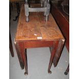 19th Century oak drop leaf table on tapering legs and pad feet. (B.P. 24% incl.