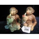 A pair of Beswick 1649 seated monkeys smoking pipes. (2) (B.P. 24% incl.