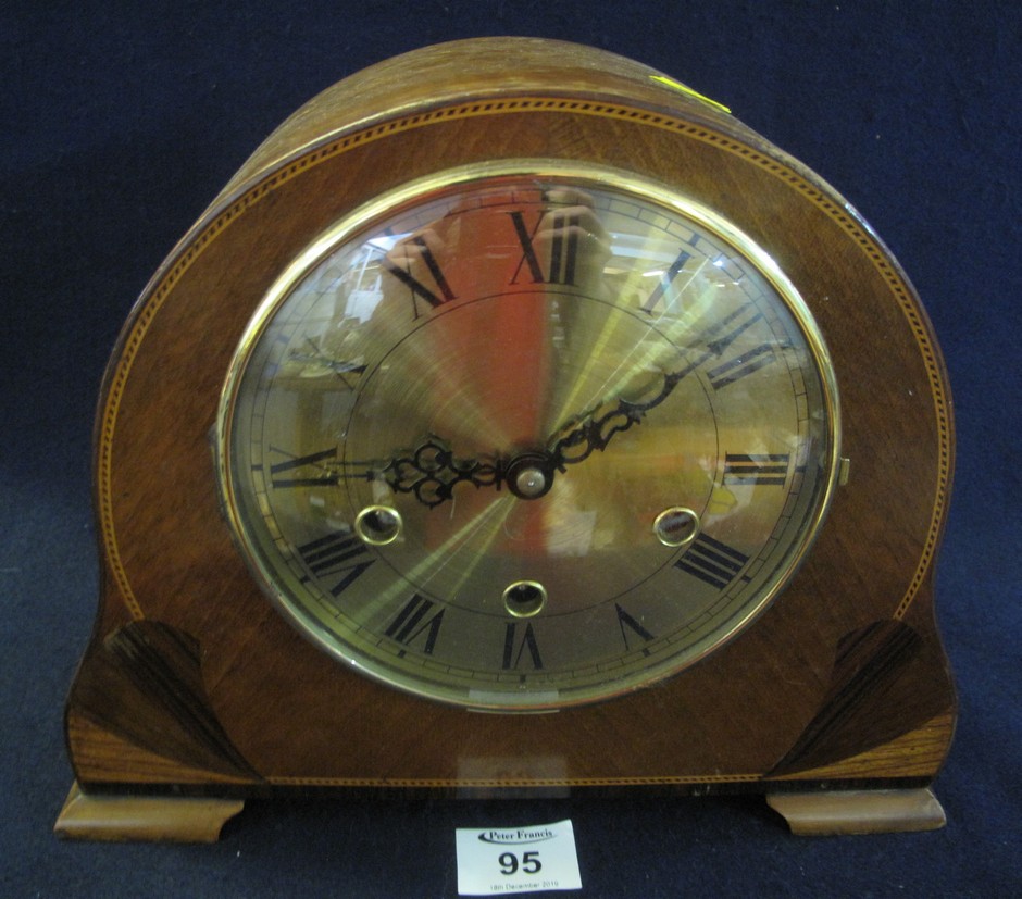 Mid 20th Century three train arched mantel clock with brass Roman face. (B.P. 24% incl.