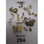 A collection of 9ct gold and other jewellery including; a diamond pendant,