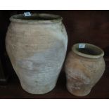 Two earthenware pottery baluster shaped jars. (2) (B.P. 24% incl.