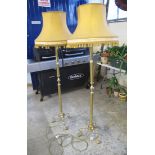 Pair of good quality brass standard lamps on triform bases with shades. (B.P. 24% incl.