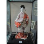 Japanese model of a Geisha girl wearing kimono in glazed display case. (B.P. 24% incl.