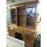 Late 19th/early 20th Century mahogany two stage cabinet backed, dog kennel dresser. (B.P. 24% incl.