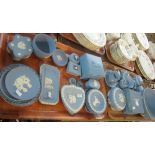 Two trays of Wedgwood blue and white Jasperware items to include; pedestal bowl, trinket boxes,