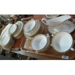 Five trays: four of Spode fine bone china 'Fleu-de-lys Gold' tea and dinnerware items,