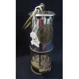 'The Protector Lamp & Lighting Co Ltd, Eccles' miner's safety lamp. (B.P. 24% incl.