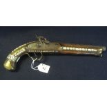 19th Century Middle Eastern percussion pistol fully stocked with brass fittings and overall inlaid