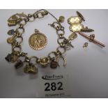 9ct gold charm bracelet with various charms, 9ct T bar and St Christopher etc. 28.