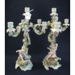 Pair of Sitzendorf German porcelain three branch table candelabrum overall encrusted with flowers