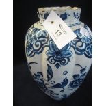 18th/19th Century Dutch Delft tin glazed earthenware vase of fluted form, overall with peacocks,