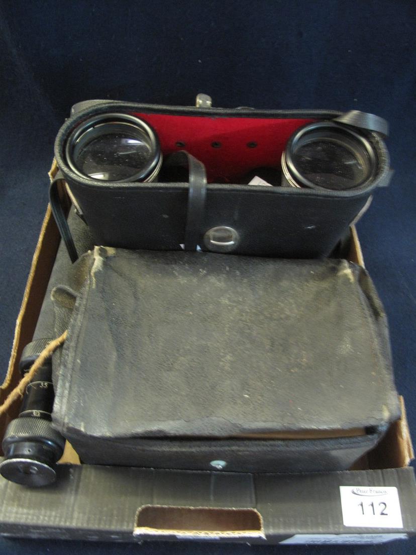 Two pairs of binoculars, a telescope and a gas mask in its original box and case. (B.P. 24% incl.