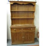 Modern natural pine two stage rack back dresser on a platform base. (B.P. 24% incl.