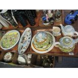 Four trays of pottery items, hand painted with varying scenes including sheep, trains, houses,
