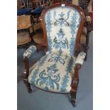 Victorian walnut button back foliate upholstered open fireside armchair. (B.P. 24% incl.