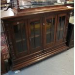 Early 20th Century oak four door glazed bookcase on projecting moulded base. (B.P. 24% incl.