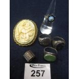 Four silver rings and a costume jewellery brooch. (B.P. 24% incl.